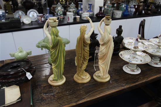 Three Royal Worcester figural lamp bases, late 19th / early 20th century, 51cm, one sconce damaged